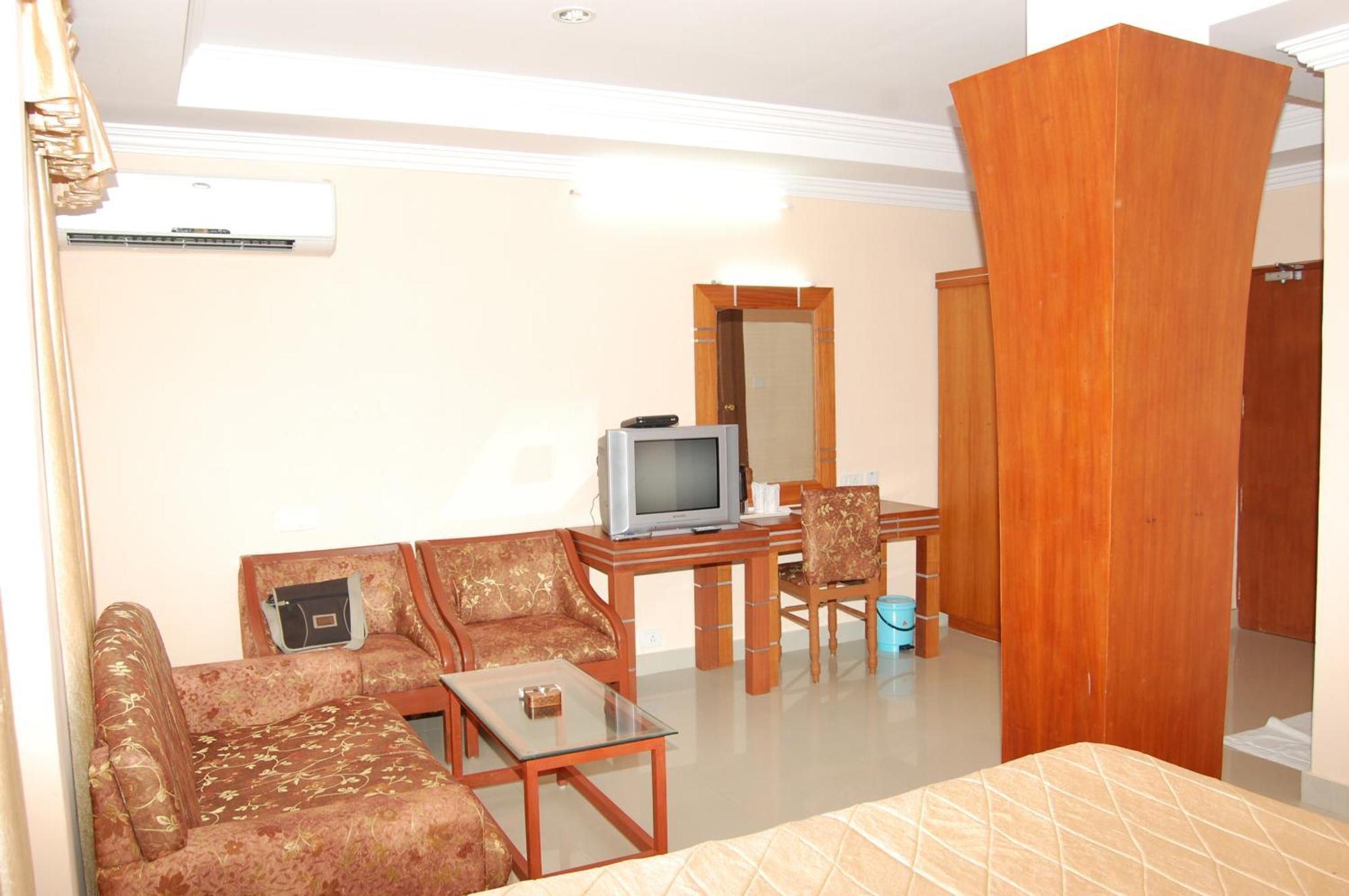 Kpm Regency Otel Palakkad Oda fotoğraf