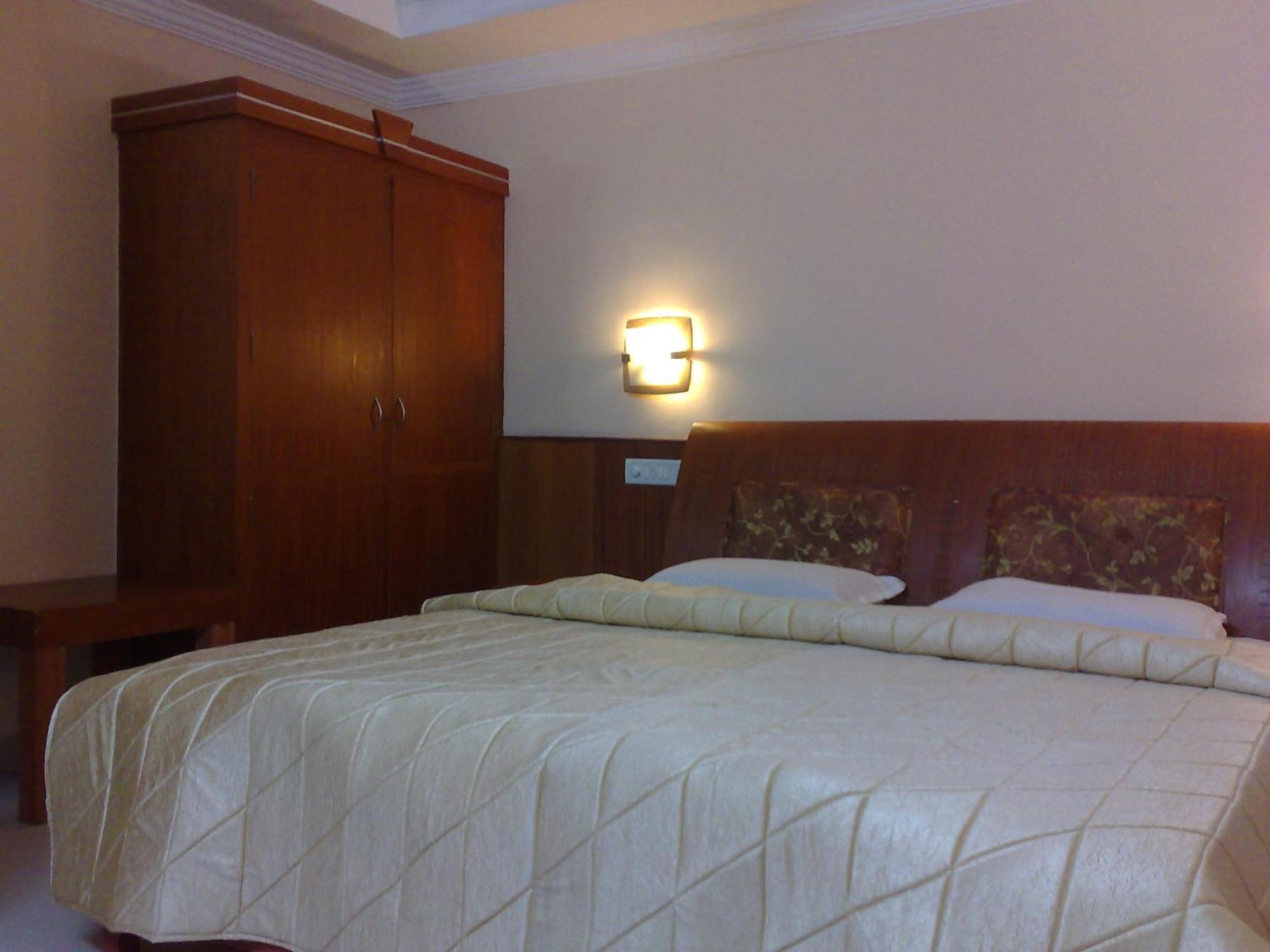 Kpm Regency Otel Palakkad Oda fotoğraf